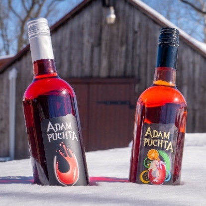 2 bottles of Adam Puchta Wine in the snow